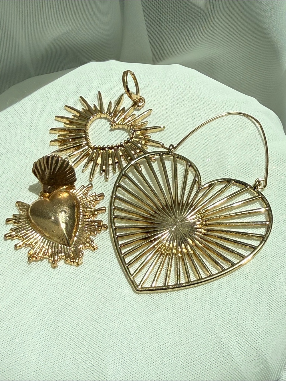 3 pair of gold heart earrings